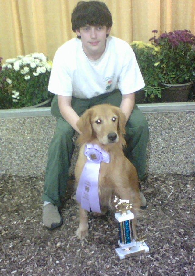 Nate and Breeze with reserve trophy and ribbon at Big E